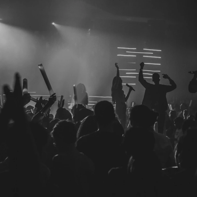 people doing a party in a room grey-scale photography